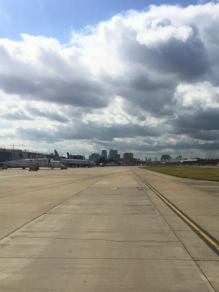 View from aeroplane window of the taxiway at London City Airport